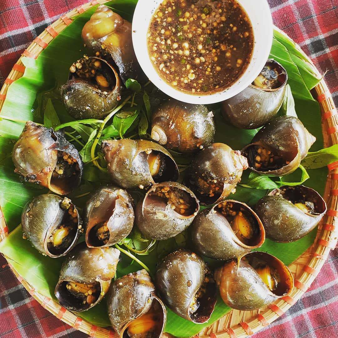 Khám phá đặc sản Ốc bươu nướng tiêu xanh Cần Thơ cực thơm ngon 5